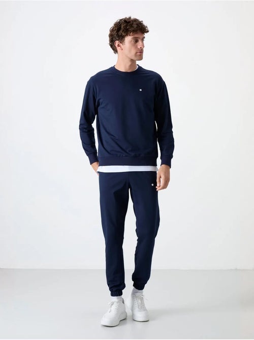 Ensemble sweat et pantalon oversize col rond tommy - Kiabi Ensemble sweat et pantalon oversize col rond tommy - Kiabi