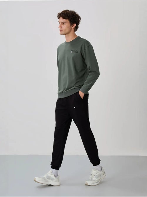 Ensemble sweat et pantalon oversize col rond tommy - Kiabi Ensemble sweat et pantalon oversize col rond tommy - Kiabi