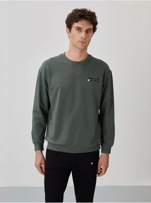 Ensemble sweat et pantalon oversize col rond tommy - Kiabi Ensemble sweat et pantalon oversize col rond tommy - Kiabi