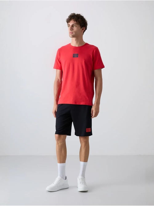 Ensemble t-shirt et short imprimé en jersey de coton tommy - Kiabi Ensemble t-shirt et short imprimé en jersey de coton tommy - Kiabi
