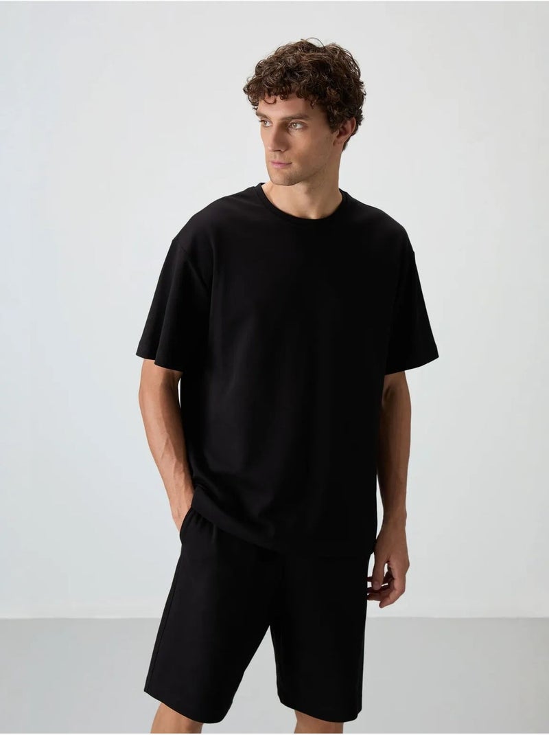Ensemble t-shirt et short oversize tommy Noir - Kiabi