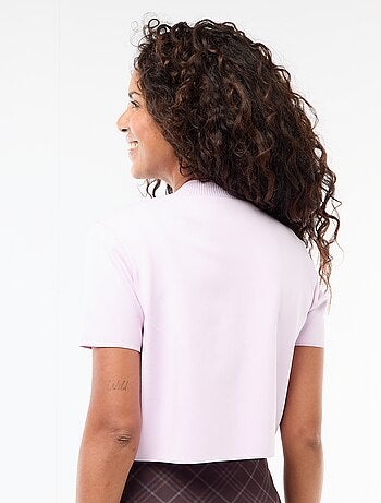 Fermeture par bijou doré au col