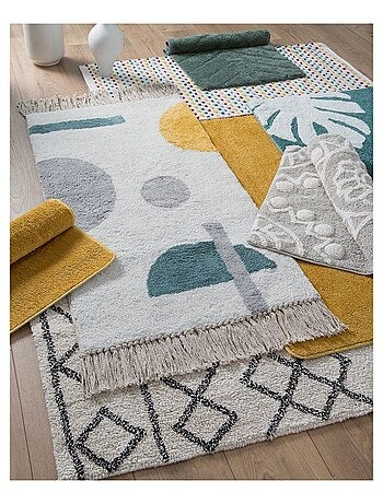 Figuurlijk decoratief tapijt met katoenen franjes.