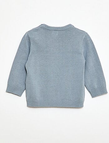 Fijngebreide trui met knoopsluiting bij de hals