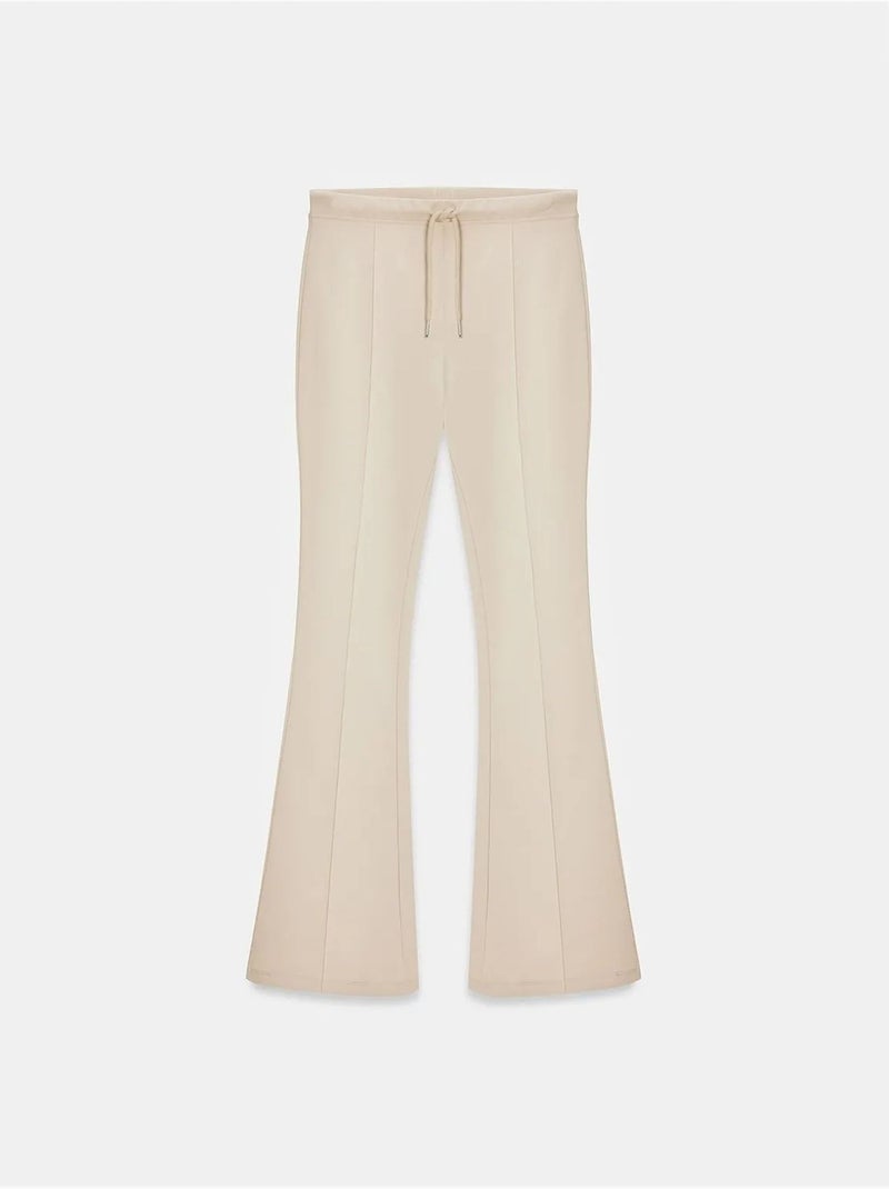 Flared jerseybroek met middelhoge taille en trekkoord dilvin Klei-beige - Kiabi
