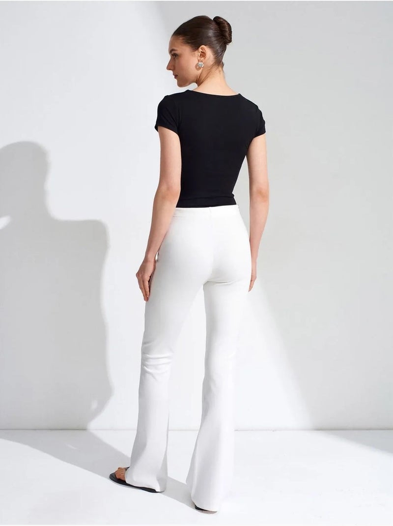 Flared jerseybroek met middelhoge taille en trekkoord dilvin Wit - Kiabi