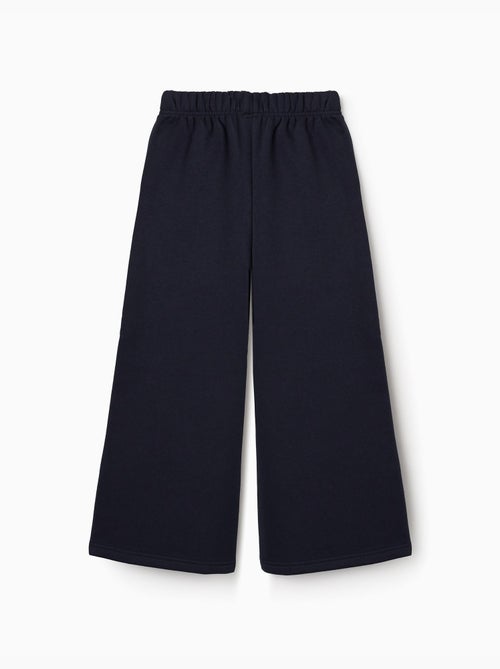 Fleece broek met wijde pijpen en geruwde voering - Kiabi Fleece broek met wijde pijpen en geruwde voering - Kiabi