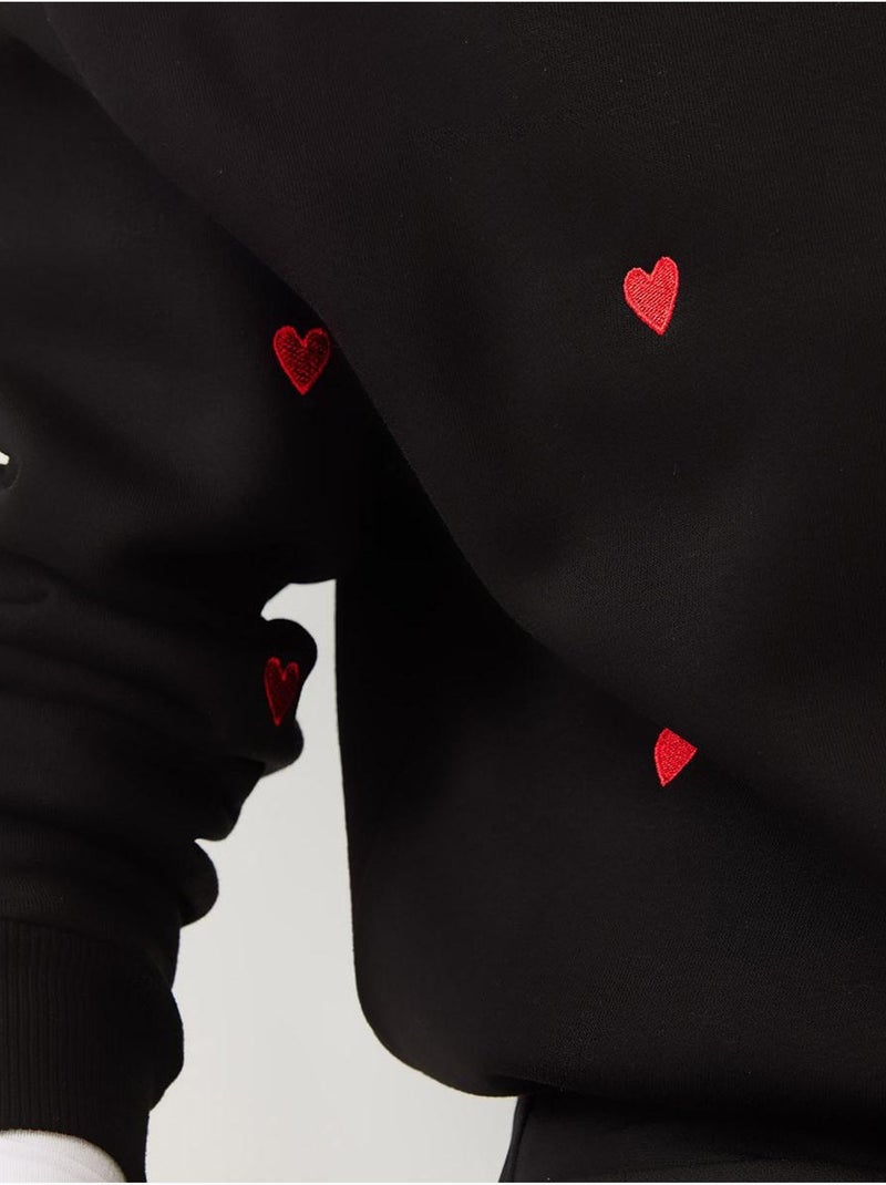 Geborduurde sweatshirt met ronde hals en relaxed fit lucci Zwart - Kiabi