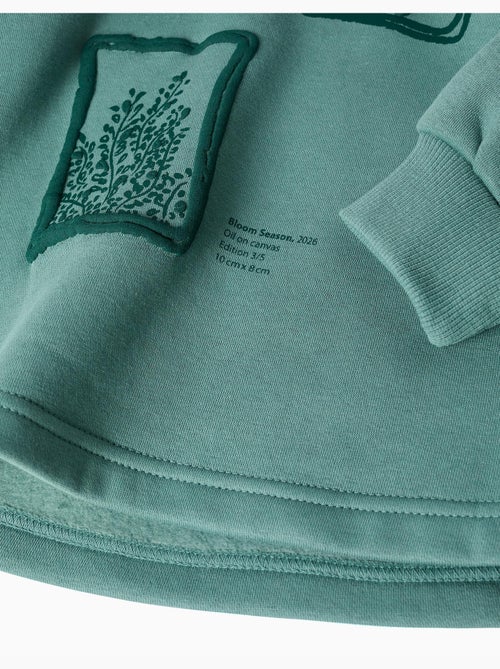 Geborstelde sweatshirt met capuchon met bloemenprint - Kiabi Geborstelde sweatshirt met capuchon met bloemenprint - Kiabi