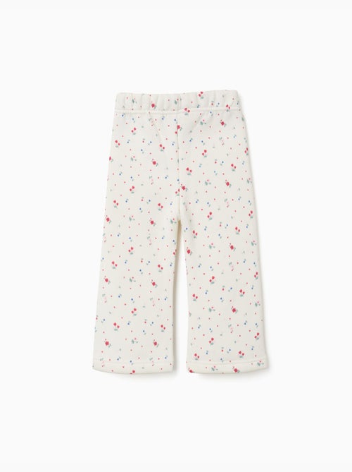 Geborstelde uitlopende broek met bloemenpatroon - Kiabi