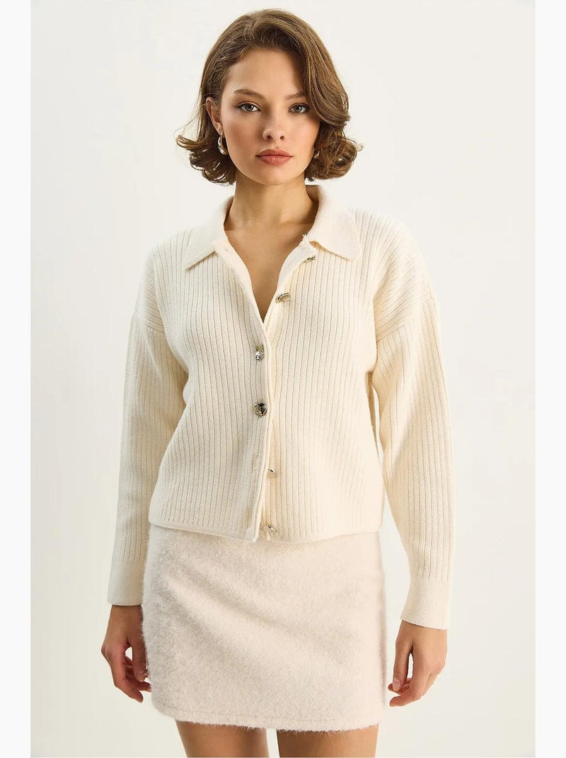 Gebreid vest met knoopsluiting lucci Crème - Kiabi