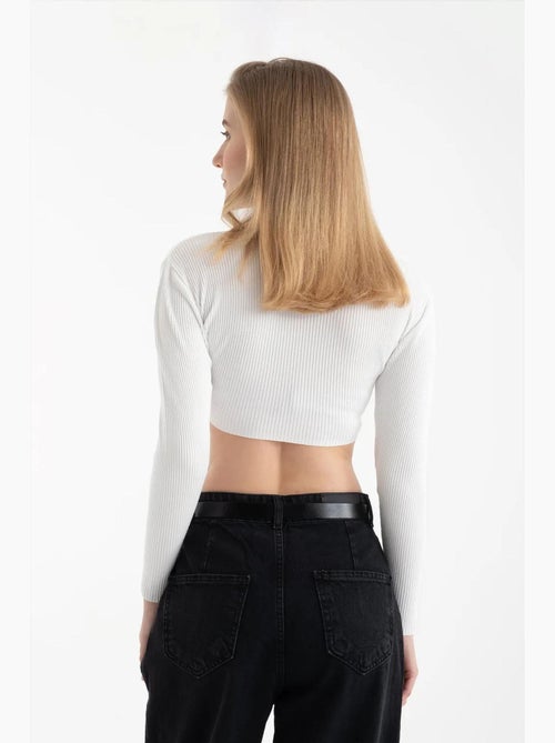 Gebreide geribbelde crop top met ronde hals en lange mouwen hiccup - Kiabi Gebreide geribbelde crop top met ronde hals en lange mouwen hiccup - Kiabi