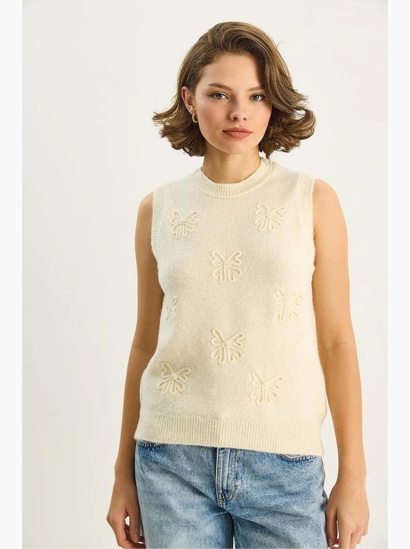 Gebreide sweater-vest met borduursel lucci Crème - Kiabi