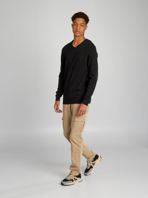 Gebreide trui met V-hals, voor personen die langer zijn dan 1m90 - Kiabi Gebreide trui met V-hals, voor personen die langer zijn dan 1m90 - Kiabi