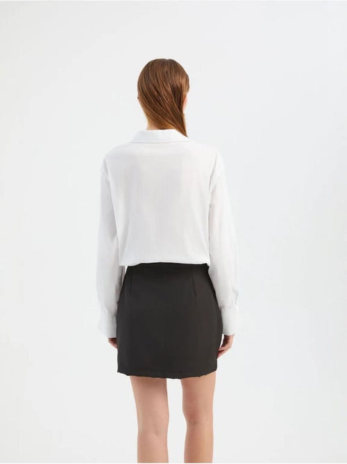 Gecombineerde mini-shirtjurk hiccup - Kiabi Gecombineerde mini-shirtjurk hiccup - Kiabi