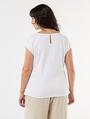 Gedrapeerd T-shirt met goudkleurig sieraad