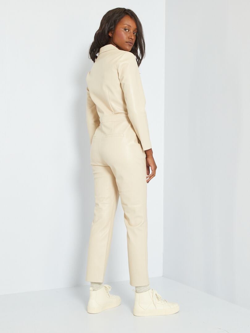 Geklede jumpsuit beige crème Kiabi 35.00€