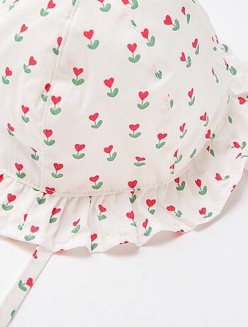 Geprinte bucket hat met ruches en trekkoordjes
