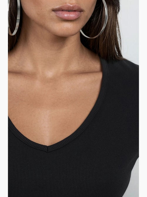 Geribbelde blouse met v-hals busem - Kiabi