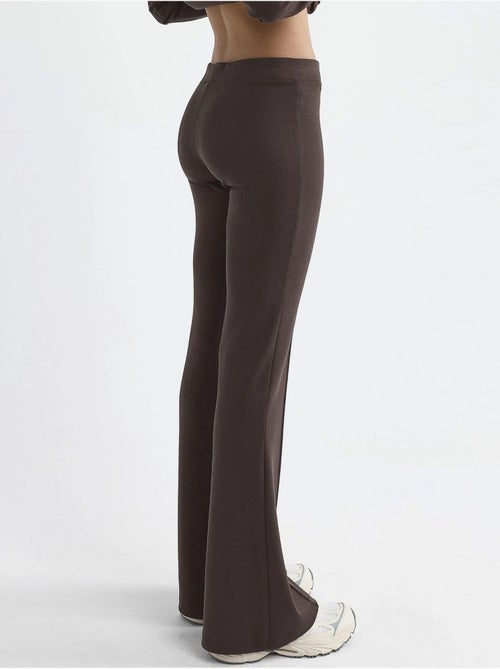 Geribde elastische flared broek busem - Kiabi