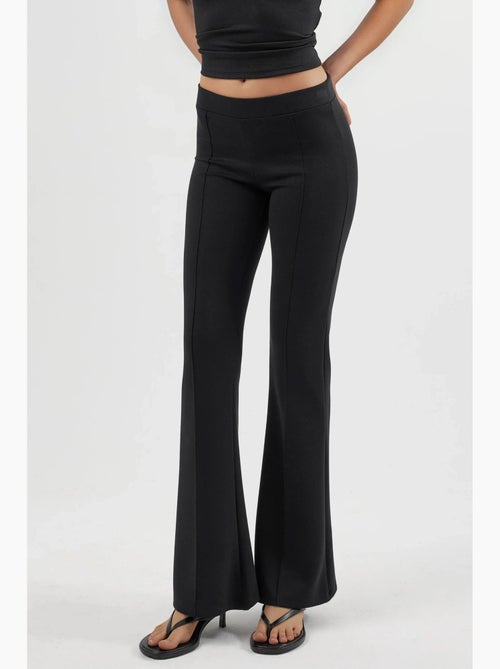 Geribde elastische flared broek busem - Kiabi Geribde elastische flared broek busem - Kiabi