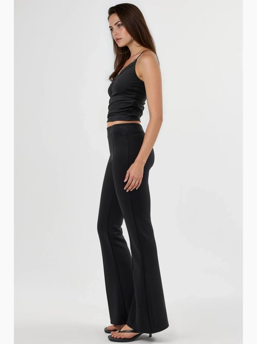 Geribde elastische flared broek busem - Kiabi Geribde elastische flared broek busem - Kiabi