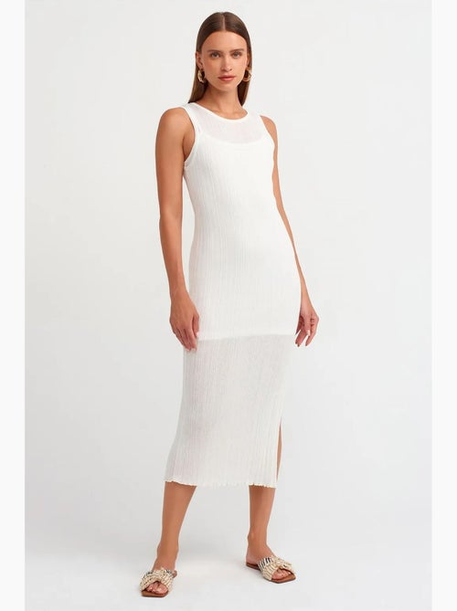 Geribde mouwloze bodycon midi-jurk dilvin - Kiabi Geribde mouwloze bodycon midi-jurk dilvin - Kiabi