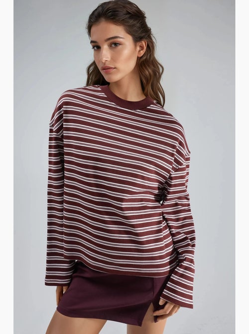 Gestreept t-shirt met ronde hals en lange mouwen busem - Kiabi Gestreept t-shirt met ronde hals en lange mouwen busem - Kiabi