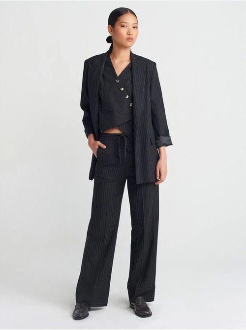 Gestreepte broek met wijde pijpen dilvin - Kiabi Gestreepte broek met wijde pijpen dilvin - Kiabi