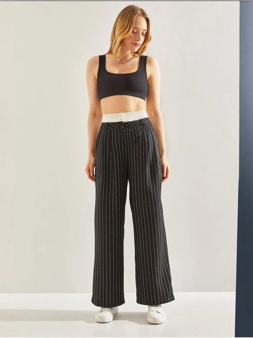 Gestreepte geweven broek met contrasterende tailledetail lucci - Kiabi Gestreepte geweven broek met contrasterende tailledetail lucci - Kiabi