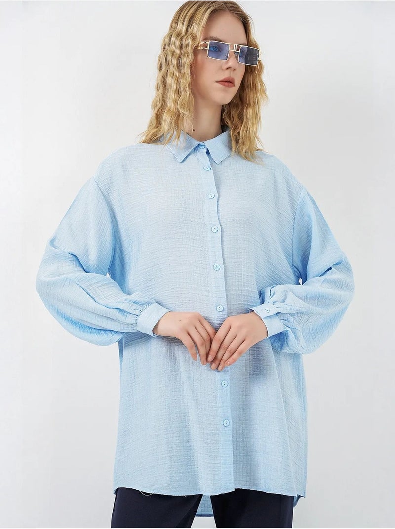 Gestructureerde lange oversized blouse met blousekraag bdart Lichtblauw - Kiabi