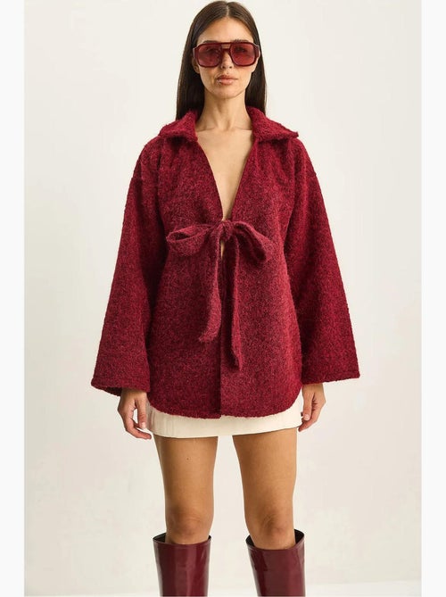 Getextureerd oversized vest met v-hals en striksluiting lucci - Kiabi Getextureerd oversized vest met v-hals en striksluiting lucci - Kiabi