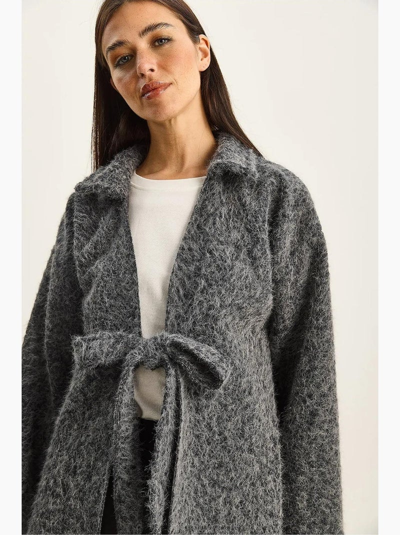 Getextureerd oversized vest met v-hals en striksluiting lucci Grijs - Kiabi