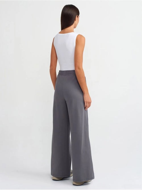 Getextureerde katoenen broek met wijde pijp dilvin - Kiabi Getextureerde katoenen broek met wijde pijp dilvin - Kiabi
