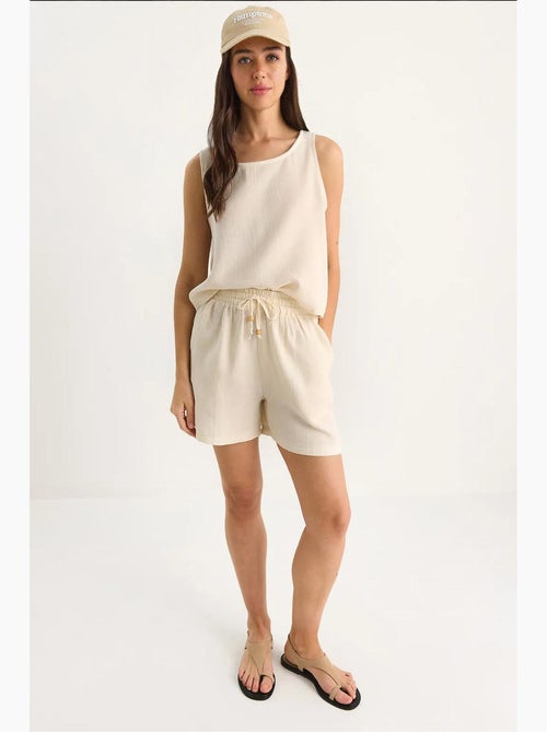 Getextureerde katoenen tweedelige co-ord set met ronde hals lucci - Kiabi Getextureerde katoenen tweedelige co-ord set met ronde hals lucci - Kiabi