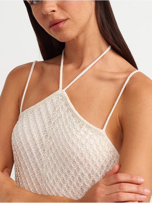 Getextureerde Midi-jurk Met Halter En Cut-out - Kiabi Getextureerde Midi-jurk Met Halter En Cut-out - Kiabi