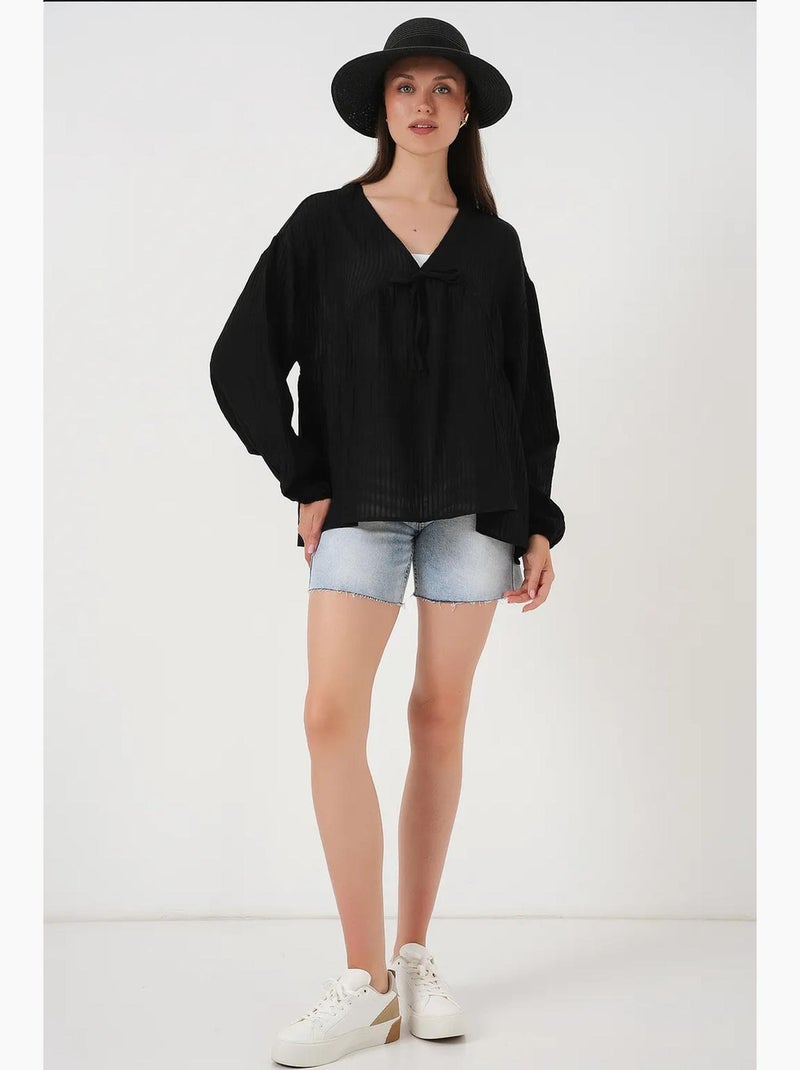 Getextureerde seersucker blouse met v-hals en striksluiting bdart Zwart - Kiabi