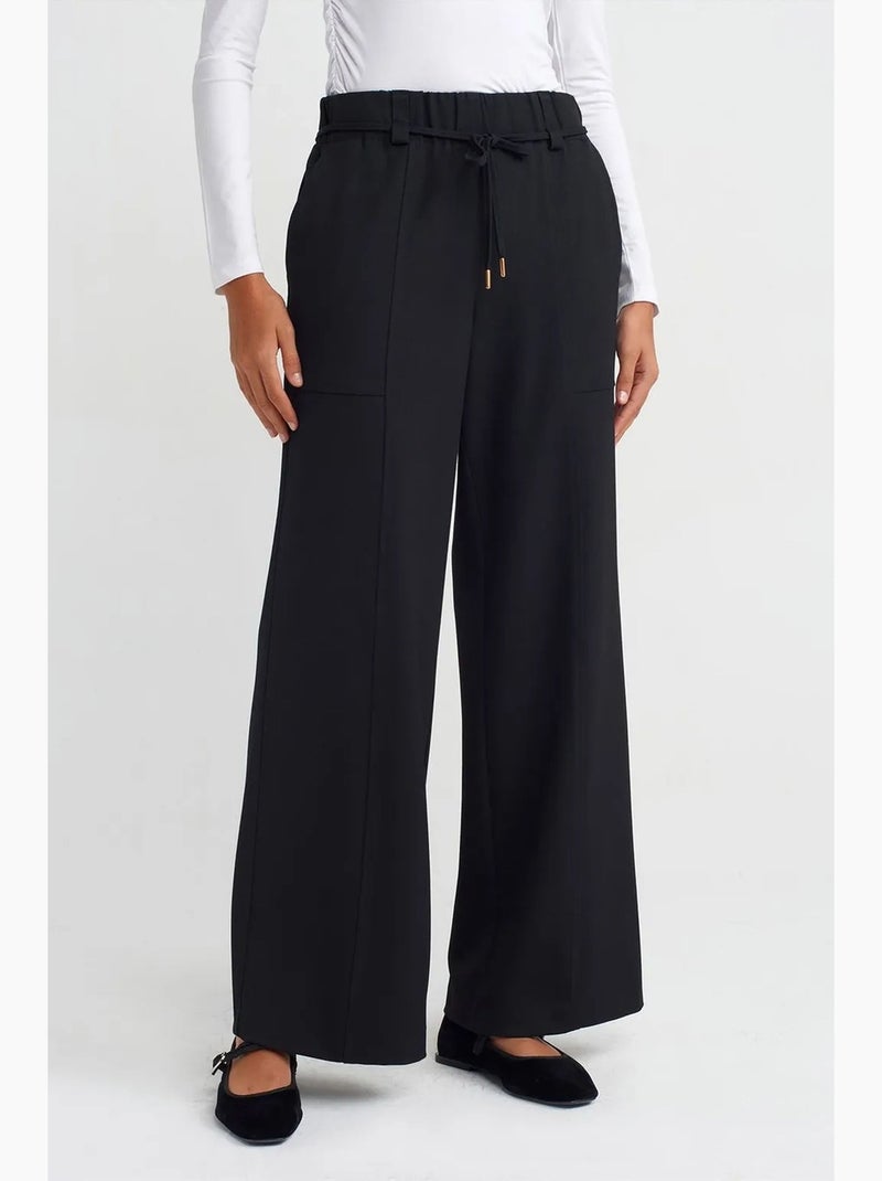 Geweven wide-leg broek met elastische taille en trekkoord dilvin Zwart - Kiabi
