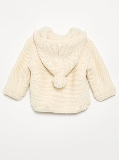 Gilet au point mousse doublé à capuche - Kiabi Gilet au point mousse doublé à capuche - Kiabi