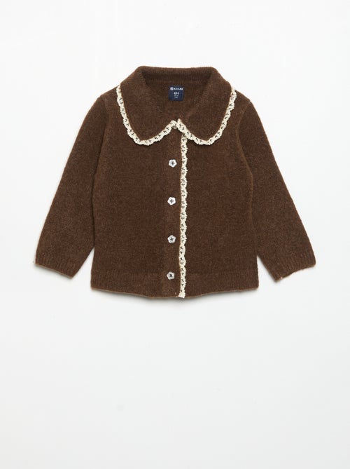 Gilet avec bords en fine dentelle - Kiabi Gilet avec bords en fine dentelle - Kiabi