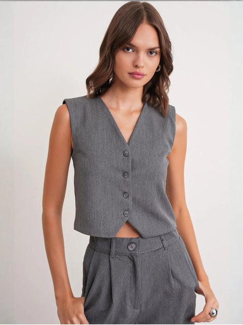 Gilet boutonné à col en v mixray - Kiabi Gilet boutonné à col en v mixray - Kiabi