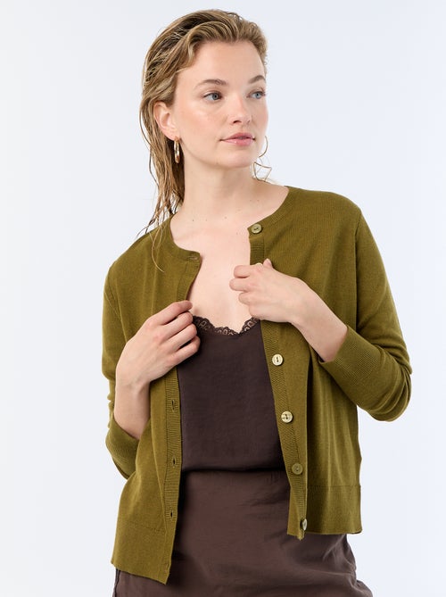 Gilet col rond uni - Kiabi Gilet col rond uni - Kiabi