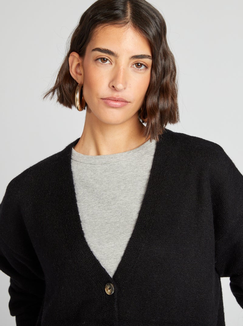 Gilet en maille avec 2 poches plaquées noir - Kiabi