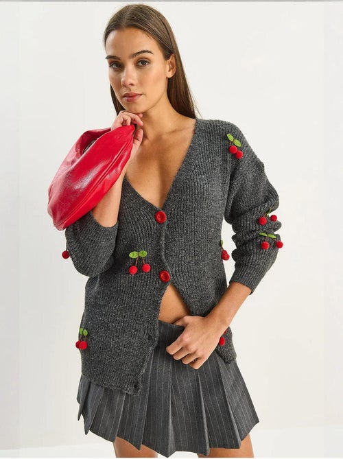Gilet en maille côtelée à col v avec fermeture boutonnée lucci - Kiabi Gilet en maille côtelée à col v avec fermeture boutonnée lucci - Kiabi