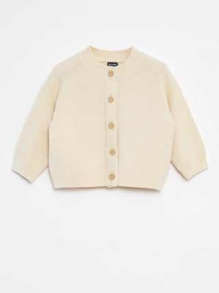 Gilet en point mousse avec ouverture boutonnée
