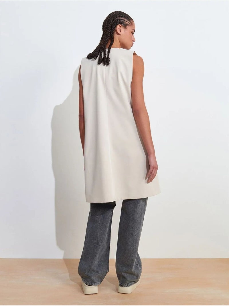 Gilet long en crêpe tissée avec découpe dilvin Crème - Kiabi