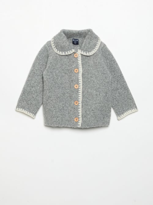 Gilet met contrasterende fantasieboorden - Kiabi Gilet met contrasterende fantasieboorden - Kiabi