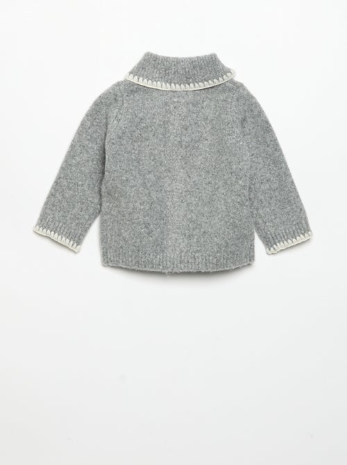 Gilet met contrasterende fantasieboorden - Kiabi Gilet met contrasterende fantasieboorden - Kiabi