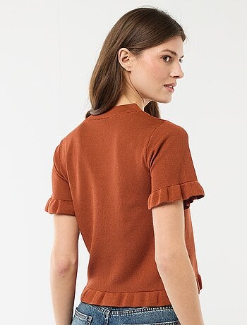 Gilet met knoopsluiting en volants aan de mouwen