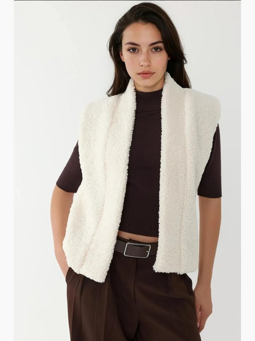 Gilet texturé sans manches à col hiccup - Kiabi Gilet texturé sans manches à col hiccup - Kiabi